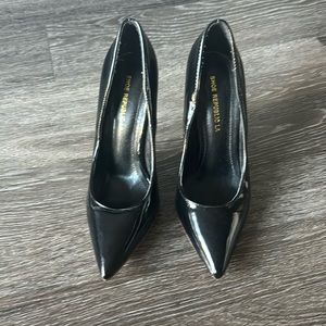 Black pointed toe high heels